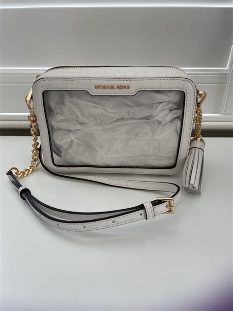 are letters on michael kors purse supposed to discolor|Michael Kors clear crossbody bag.